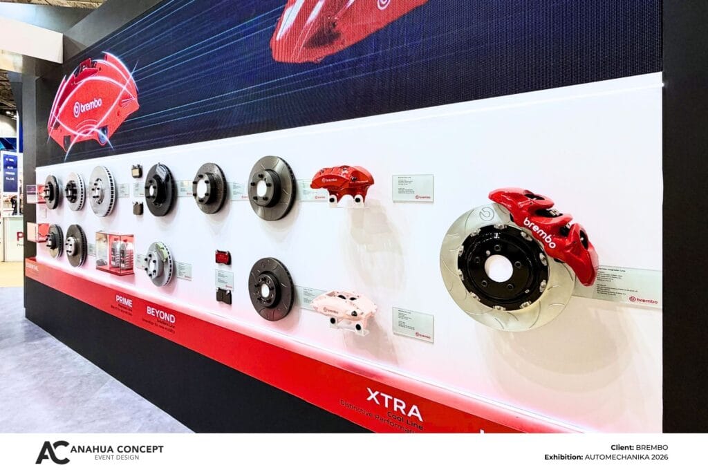 Reception area and brand identity within the Brembo exhibition booth